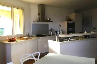 Cuisine ou kitchenette dans l'établissement Villa Roccu
