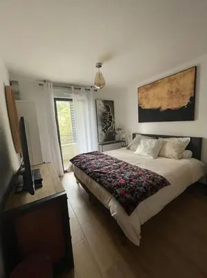 Un ou plusieurs lits dans un hébergement de l'établissement Appartement calme proche Bastia