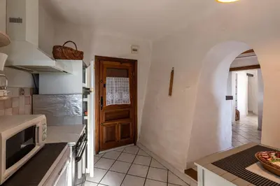 Cuisine ou kitchenette dans l'établissement Pentone