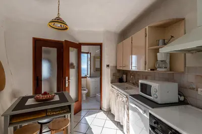 Cuisine ou kitchenette dans l'établissement Pentone