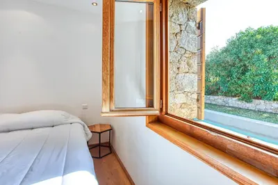 Un ou plusieurs lits dans un hébergement de l'établissement Villa Stella