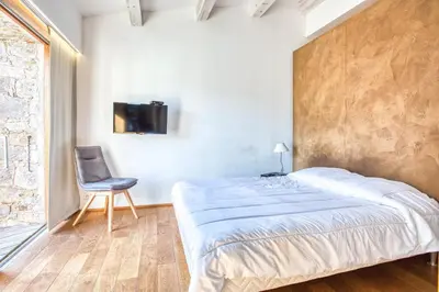 Un ou plusieurs lits dans un hébergement de l'établissement Villa Stella