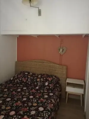 Un ou plusieurs lits dans un hébergement de l'établissement Appartement au coeur de la citadelle