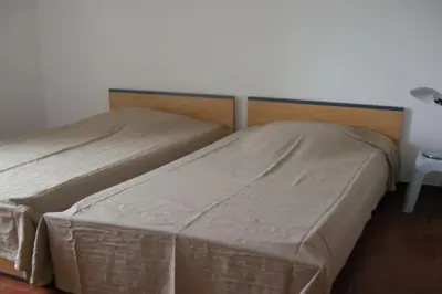 Un ou plusieurs lits dans un hébergement de l'établissement Appartement 8 pers. - Domaine de Padulone ALERIA