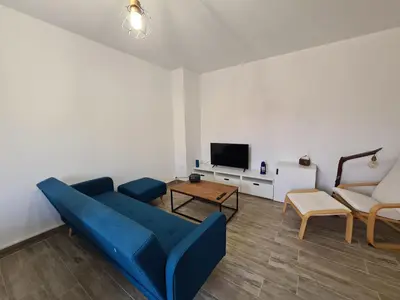 Télévision ou salle de divertissement dans l'établissement Appartement rénové indépendant avec garage au centre du village