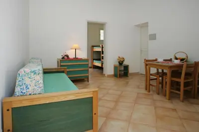 Coin salon dans l'établissement Apartment by Lido Beach & Biguglia Lagoon