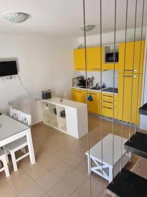 Cuisine ou kitchenette dans l'établissement Résidence Saint Florent Oletta
