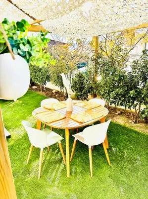 Jardin de l'établissement T2 « Bohème » avec Spa…