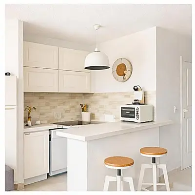 Cuisine ou kitchenette dans l'établissement Le Cocon de Lilie