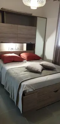 Un ou plusieurs lits dans un hébergement de l'établissement A 700m de la plage,villa FAMIGLIA avec piscine