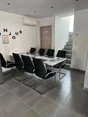 Coin salon dans l'établissement A 700m de la plage,villa FAMIGLIA avec piscine