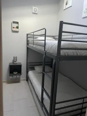 Un ou plusieurs lits dans un hébergement de l'établissement La Bergerie Furiani avec piscine privée Residence Digoune