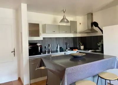 Cuisine ou kitchenette dans l'établissement resd. cala di mare
