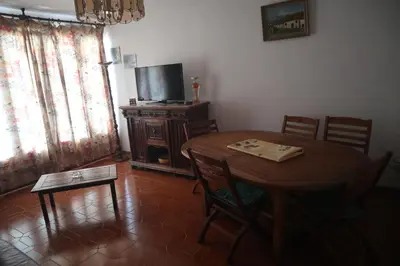 Télévision ou salle de divertissement dans l'établissement Appartement dernier étage vue imprenable sur mer