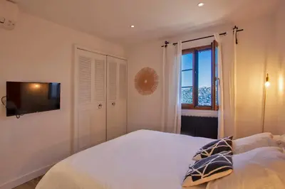 Un ou plusieurs lits dans un hébergement de l'établissement Casa Lisa - appartement dans le village de Monticello vue mer