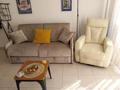 Coin salon dans l'établissement Les villas de Mélody