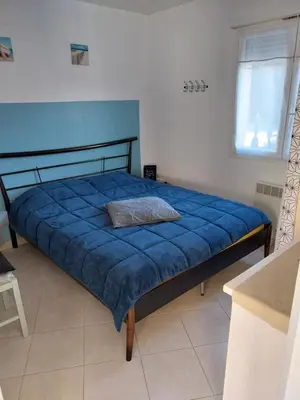 Un ou plusieurs lits dans un hébergement de l'établissement Les villas de Mélody