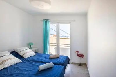 Un ou plusieurs lits dans un hébergement de l'établissement La Maison de B