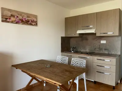 Cuisine ou kitchenette dans l'établissement Punta di Mare