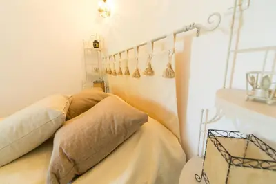 Un ou plusieurs lits dans un hébergement de l'établissement Appartement T2 rez de villa