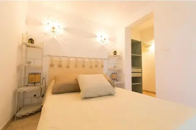 Un ou plusieurs lits dans un hébergement de l'établissement Appartement T2 rez de villa