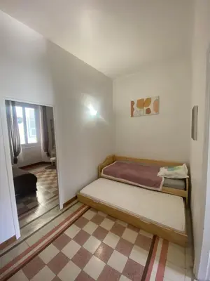 Un ou plusieurs lits dans un hébergement de l'établissement appartement climatisé,IDEALEMENT SITUE 100m du vieux port.
