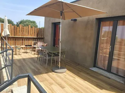 Balcon ou terrasse dans l'établissement T2 Neuf climatisé dans villa à Corbara