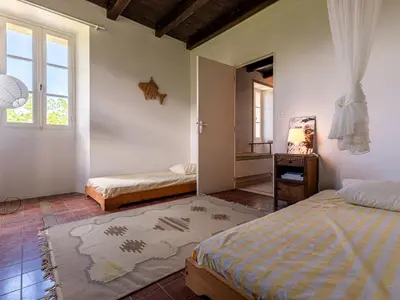 Un ou plusieurs lits dans un hébergement de l'établissement Holiday Home Maison Penta by Interhome