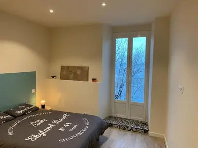 Un ou plusieurs lits dans un hébergement de l'établissement Appartement rénové vue mer - citadelle de Bastia