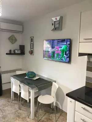 Cuisine ou kitchenette dans l'établissement T2 Classé avec garage Centre ville et plage à 300 m ,Clim Wifi