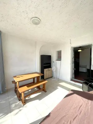Cuisine ou kitchenette dans l'établissement Studio cosy à Linguizzetta 32 m² avec terrasse privée