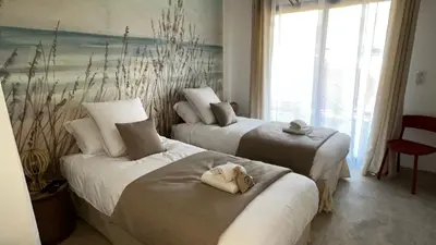 Un ou plusieurs lits dans un hébergement de l'établissement Villas Vallée d'ASCO