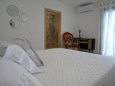 Un ou plusieurs lits dans un hébergement de l'établissement Casa l'Ortulanu