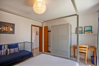 Un ou plusieurs lits dans un hébergement de l'établissement casa notte appart spacieux calme Plage et centre de calvi 15 min à pied