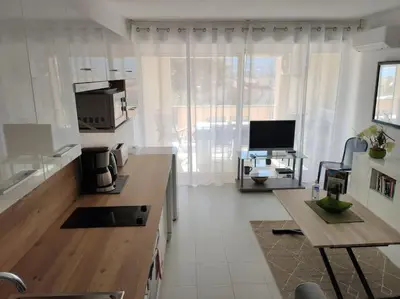 Cuisine ou kitchenette dans l'établissement COEUR DE CALVI
