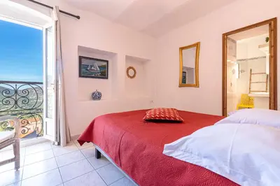 Un ou plusieurs lits dans un hébergement de l'établissement Alla Casa - Appt pour 6 avec terrasse