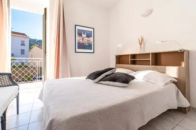 Un ou plusieurs lits dans un hébergement de l'établissement Alla Casa - Appt pour 6 avec terrasse