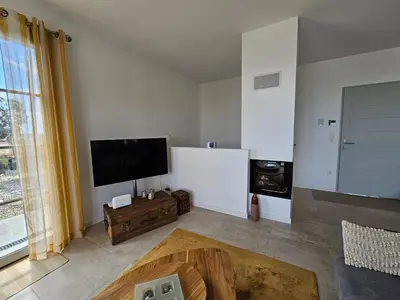 Télévision ou salle de divertissement dans l'établissement Superbe villa avec piscine- Erbalunga Cap Corse