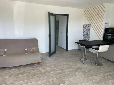 Coin salon dans l'établissement U Secondu Appart neuf spacieux au calme