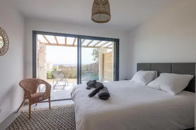 Un ou plusieurs lits dans un hébergement de l'établissement Giardinu di Luce - Appt pour 4 vue mer