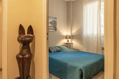 Un ou plusieurs lits dans un hébergement de l'établissement Casa Eden Roc