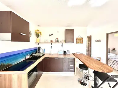 Cuisine ou kitchenette dans l'établissement Appartement 2 chambres à Lama avec Piscine