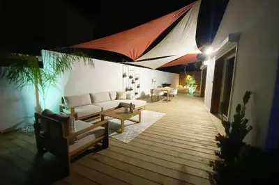 Coin salon dans l'établissement Mini Villa Indépendante à 350m de la mer (LAX)