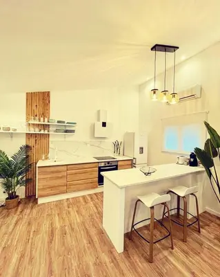 Cuisine ou kitchenette dans l'établissement Mini Villa Indépendante à 350m de la mer (LAX)