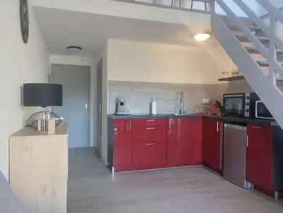 Cuisine ou kitchenette dans l'établissement Calvi duplex climatisé vue mer 4 pers
