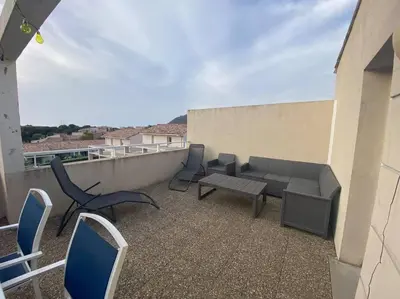 Balcon ou terrasse dans l'établissement Ma paillote a LOZARI 6/8 pers vue mer avec piscine