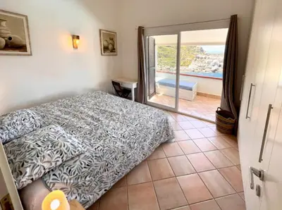 Un ou plusieurs lits dans un hébergement de l'établissement Appartement Thomaïa