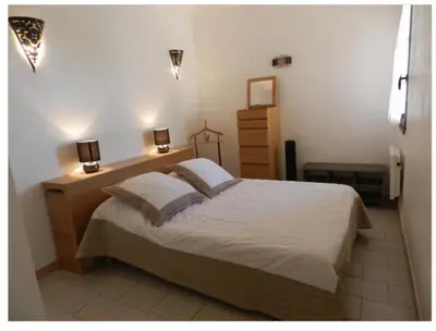 Un ou plusieurs lits dans un hébergement de l'établissement Appartement Vue Mer, piscine, minigolf, parking