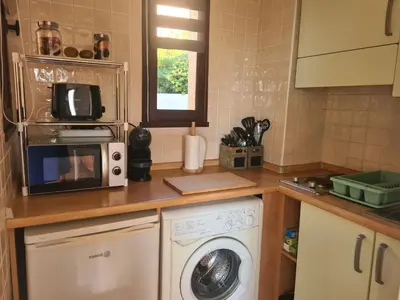 Cuisine ou kitchenette dans l'établissement Appartement Vue Mer, piscine, minigolf, parking